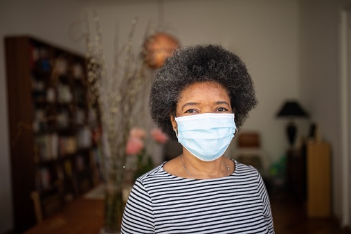 elderly woman with face mask