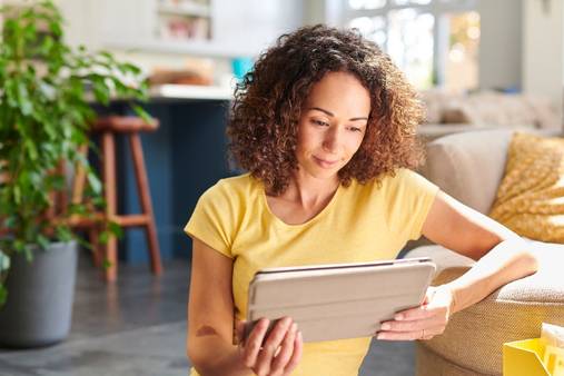 woman looking at ipad
